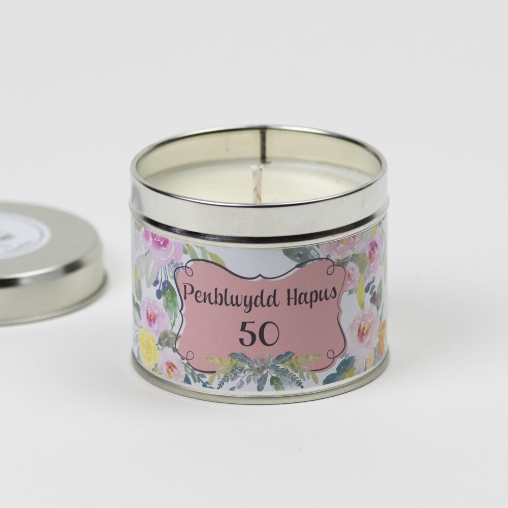 silver tin candle with floral label showing Penblwydd hapus 50 from the new additions to the range