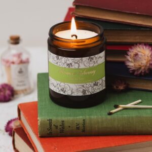 Athrawes Arbennig amber glass candle